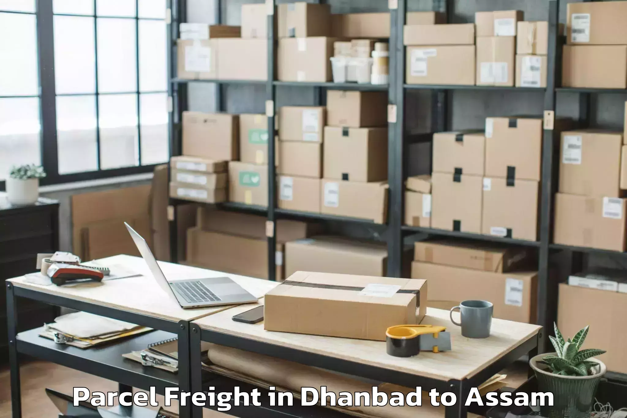 Book Dhanbad to Bongaigaon Pt Parcel Freight Online